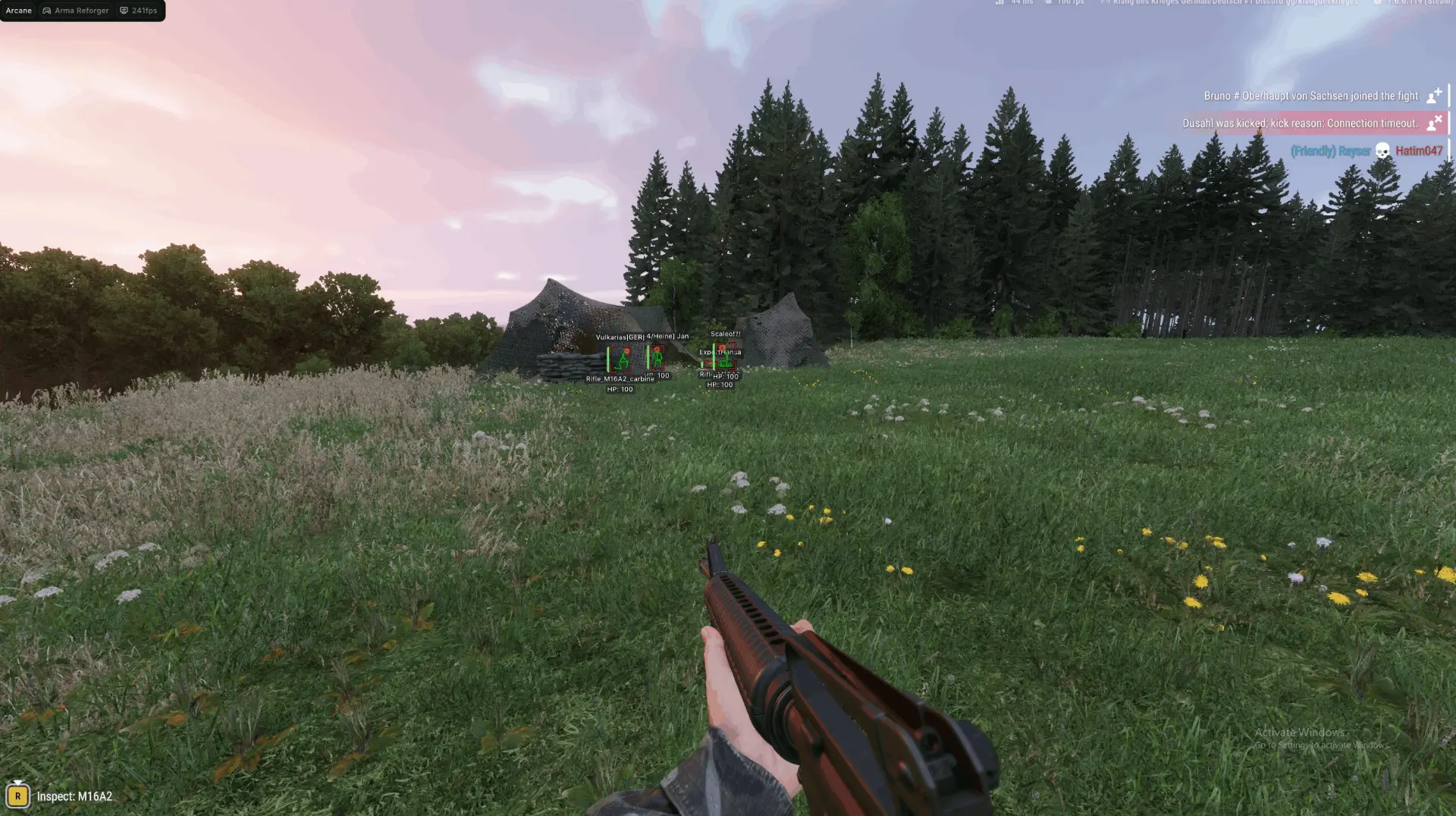ESP names and health bars on players by camouflaged tents in a meadow at sunset